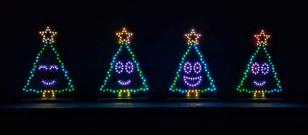 Four Mini Trees on the mantlepiece